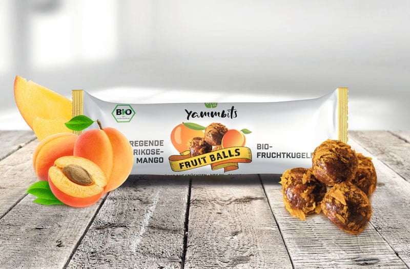 Die kleinen Fruit Balls für unterwegs in der Geschmacksrichtung "Aufregende Aprikose-Mango" 